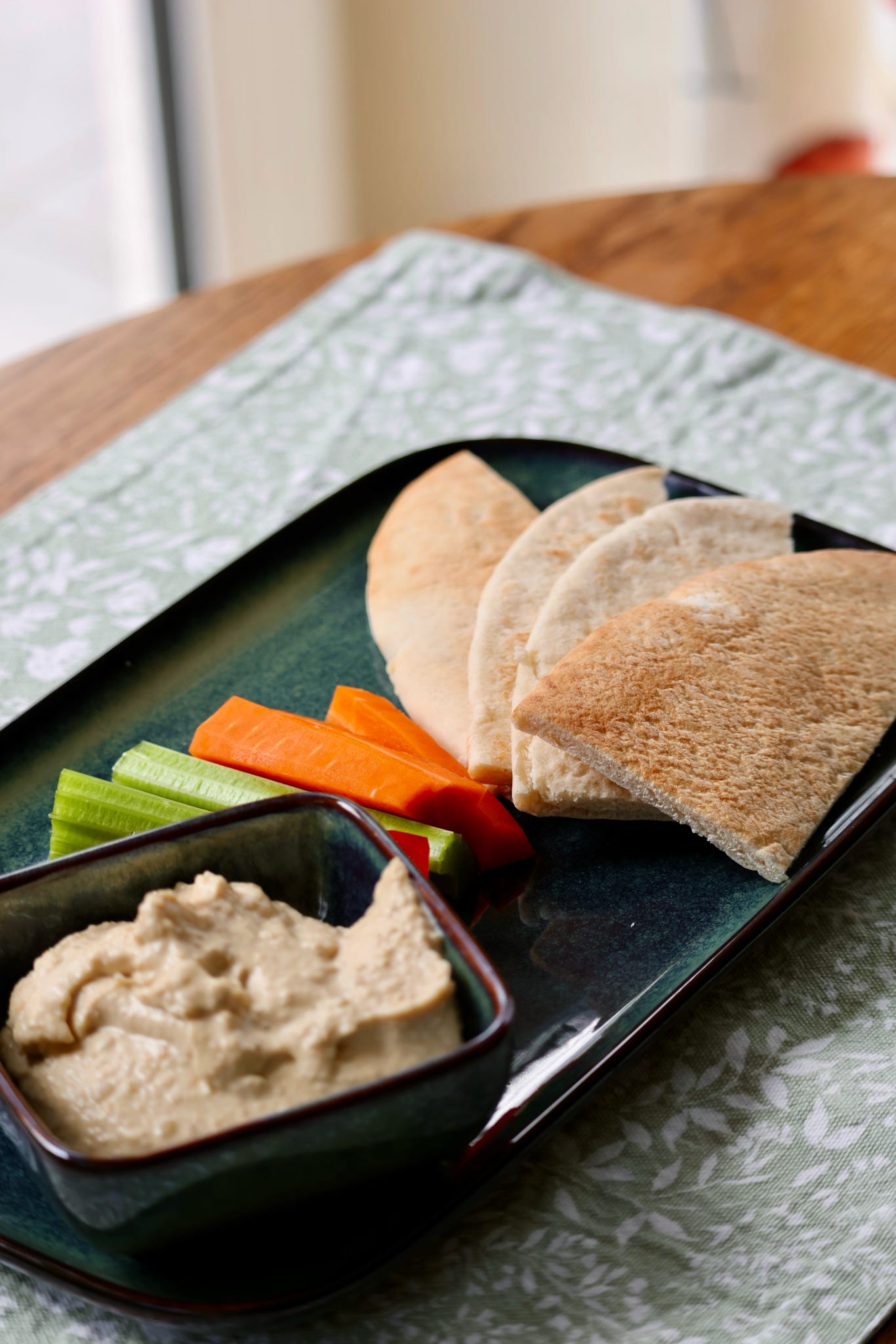 Creamy Homemade Hummus with Crunchy Crudities & Pitta Bread.